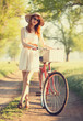Girl on a bike in the countryside.