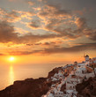 Foto: Santorini with sunset over sea in Greece, Oia village Santorini with sunset over sea in Greece, Oia village