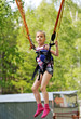 Foto: Girl jumping on a trampoline kangaroo Girl jumping on a trampoline kangaroo