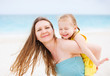 Photo: Mother and daughter having fun outdoors Mother and daughter having fun outdoors