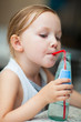 Photo: Little girl drinking water Little girl drinking water