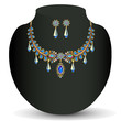 Golden necklace and earrings female with coloured precious