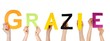 hands holding grazie