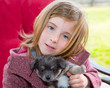 Photo: Blond girl hug a gray pyppy chihuahua dog Blond girl hug a gray pyppy chihuahua dog