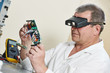 technician engineer at work with microchip