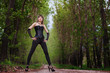 Beautiful elegant woman walking on a country road
