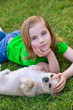 Blond happy girl with her chihuahua doggy portrait