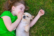 Photo: Blond happy girl with her chihuahua doggy portrait Blond happy girl with her chihuahua doggy portrait