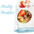 Granola (muesli) with strawberries and milk. Healthy Breakfast