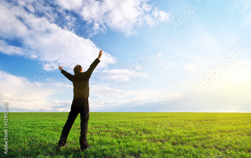 Photo: Man in green meadow Man in green meadow