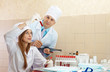 Doctor supervises the young nurse
