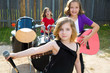 Photo: chidren singer girl singing playing live band in backyard chidren singer girl singing playing live band in backyard