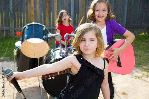 Photo: chidren singer girl singing playing live band in backyard chidren singer girl singing playing live band in backyard