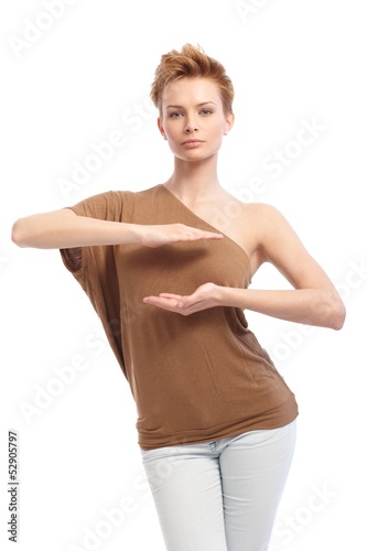 Photo: Trendy woman pretending to hold something Trendy woman pretending to hold something