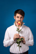 Man giving the red roses