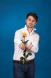 Man giving the red roses
