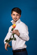Man giving the red roses