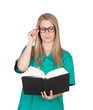 Atractive medical with glasses reading a book