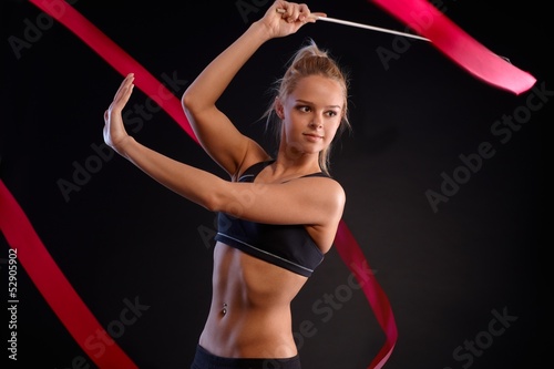 Photo: Artistic photo of gymnast with ribbon Artistic photo of gymnast with ribbon
