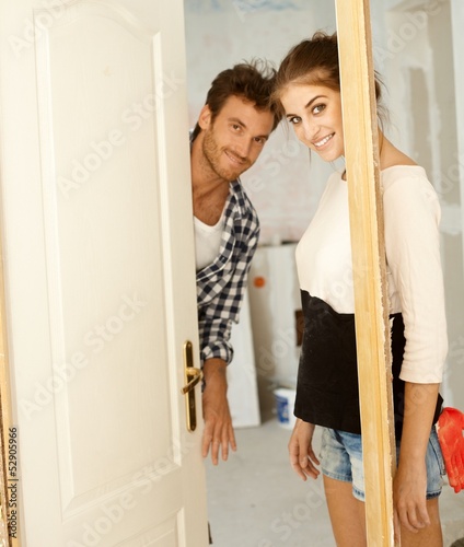 Photo: Young couple in new home Young couple in new home