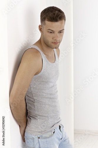 Photo: Young man in undershirt Young man in undershirt