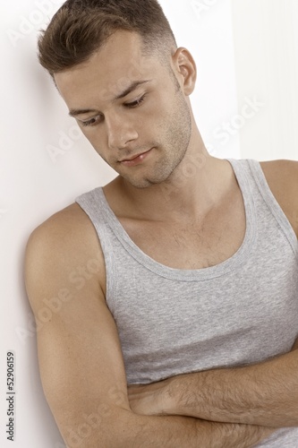 Photo: Portrait of daydreaming young man Portrait of daydreaming young man