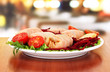 Stuffed cabbage rolls on table in cafe