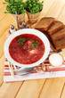 Delicious borsch on table close-up