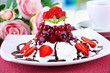 Tasty jelly dessert with fresh berries, on bright background