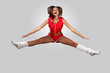 Young female dancer against white background