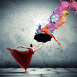 Ballet dancer in flying satin dress with umbrella