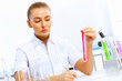Young female scientist working in laboratory