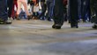 feet of people walking in the city at night