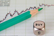 Uptrend financial chart of the stock market,  green pencil and d