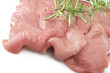 Veal meat and rosemary close up on white