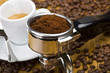 An espresso machine group head with fresh ground coffee