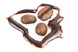 Coffee beans and chocolate close up on the white