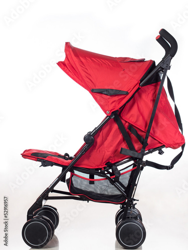 Photo: Red baby stroller side view Red baby stroller side view