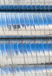 Photo: New shining metal tubes background texture New shining metal tubes background texture