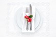 Place setting decorated with carnations