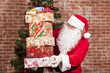 Santa Claus brings Christmas gifts