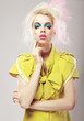 Vivid Blond Hair Woman with  Conspicuous Makeup. Glamor