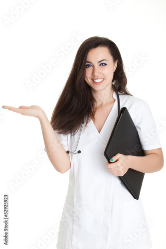 Photo: Smiling medical doctor woman Isolated over white background. Se Smiling medical doctor woman Isolated over white background. Se
