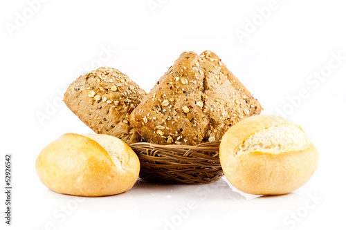 Photo: Bread on a white background. delicious buns isolated on white Bread on a white background. delicious buns isolated on white