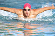 Photo: Swimmer athletic man swimming butterfly Swimmer athletic man swimming butterfly