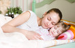 mother and daughter sleep together