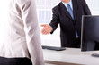 Businessman and Businesswoman in office