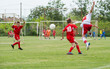 boys  kicking football