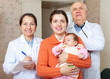 doctors and mother with  baby