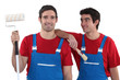 Two decorators dressed exactly the same